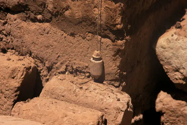 Archaeologists working on an excavation site